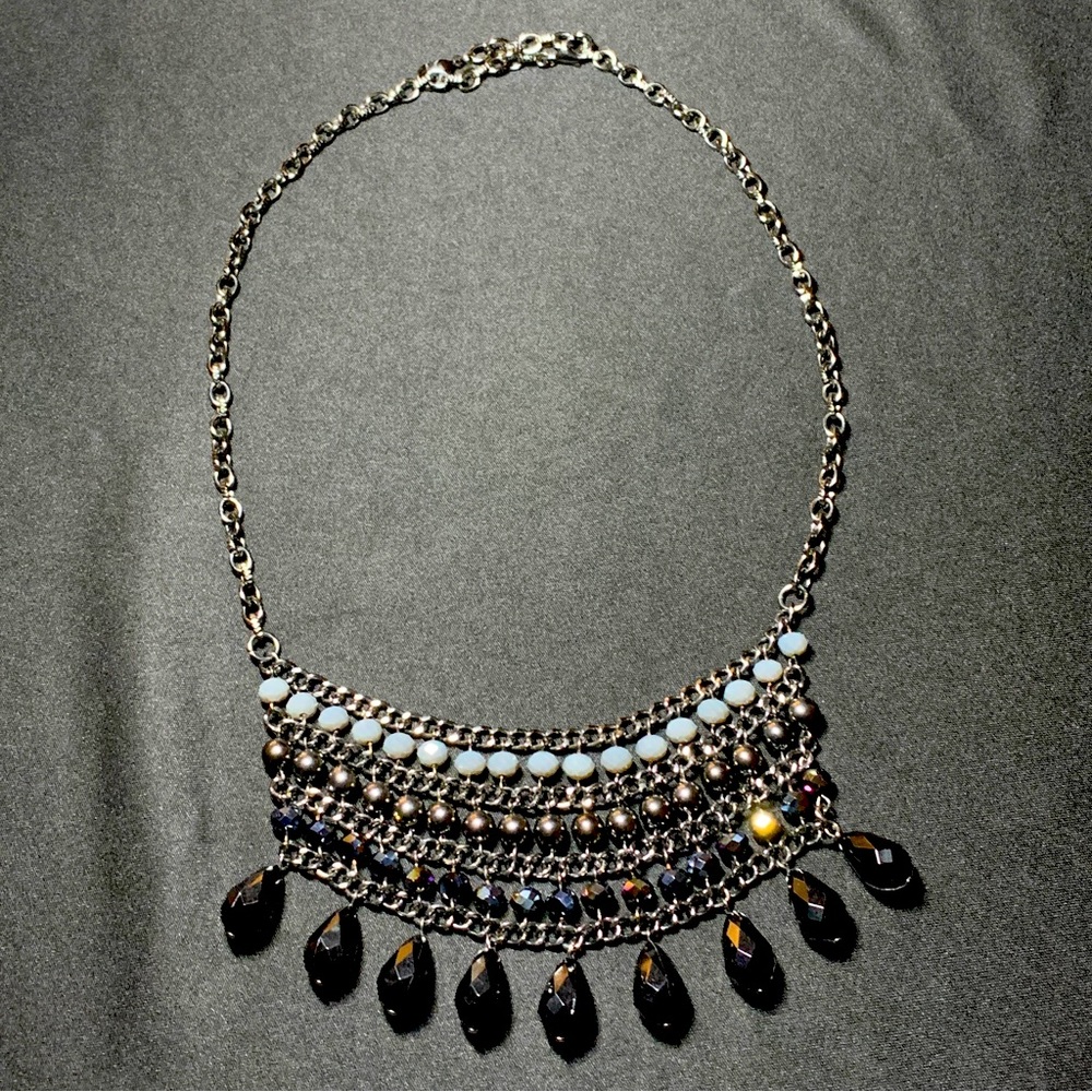 Silver and black bib necklace with double clasp.  24" long.